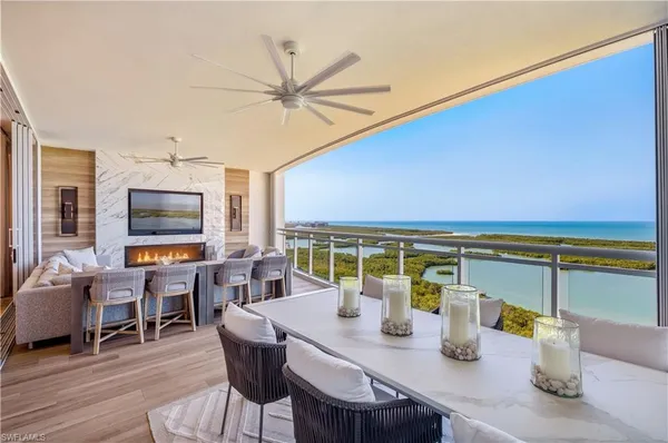 a view of a dining room with furniture window and outside view
