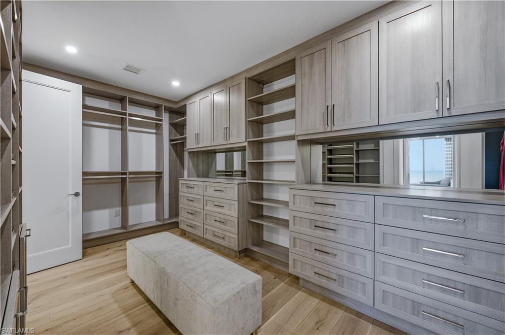 13945 Old Coast Road, Unit PH05 Naples, FL 34110 - Photo 18 of 37 a living room with furniture