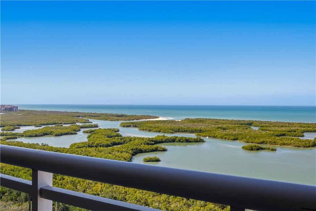13945 Old Coast Road, Unit PH05 Naples, FL 34110 - Photo 20 of 37 a view of an ocean from a balcony