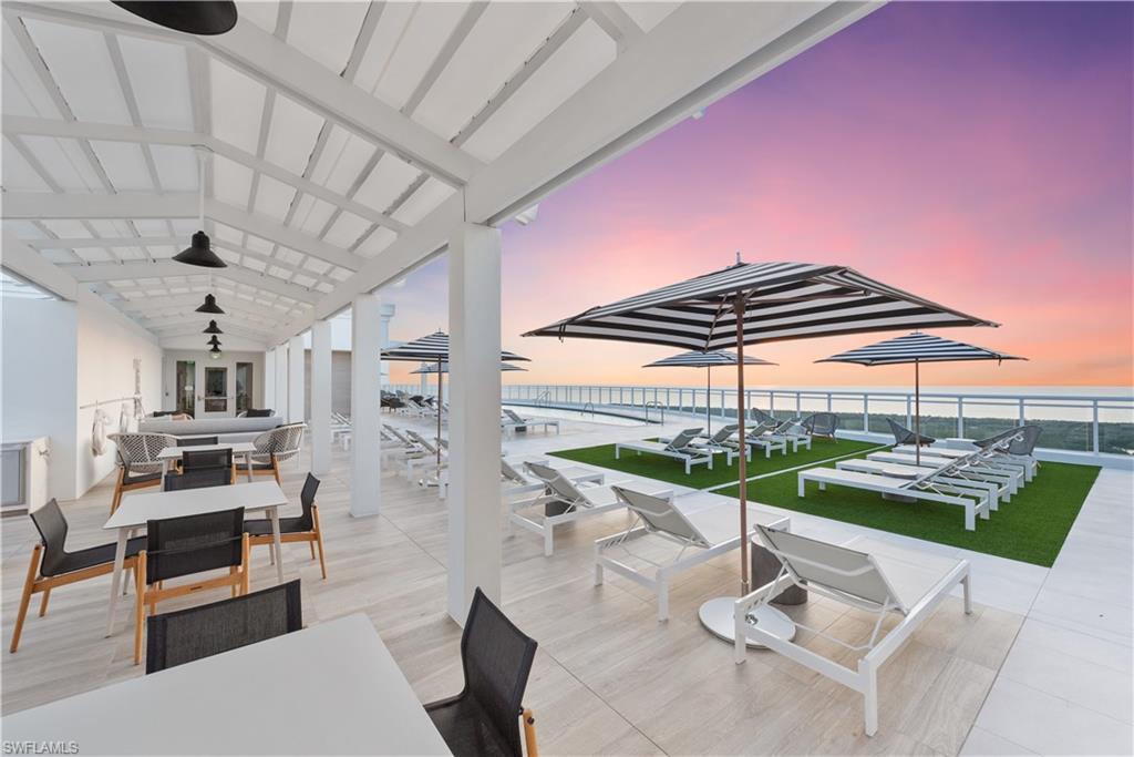 13945 Old Coast Road, Unit PH05 Naples, FL 34110 - Photo 33 of 37 a outdoor space with furniture