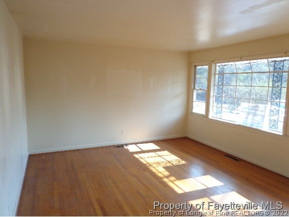 310 Turnpike Road Raeford, NC 28376 - Photo 5 of 6 a view of an empty room and window