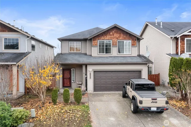 a car parked in front of a house