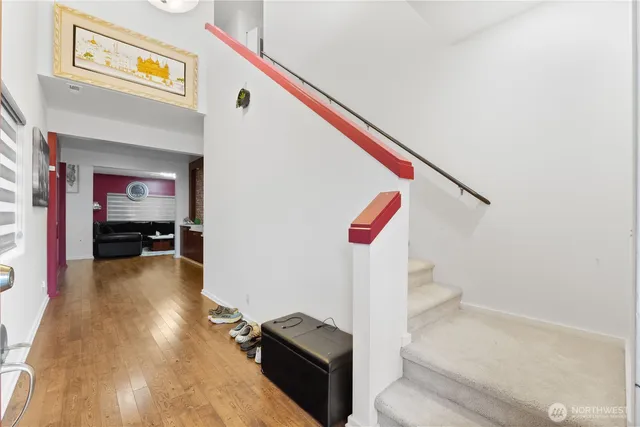 a living room with furniture and a rug