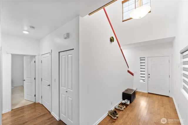 a view of entryway with wooden floor