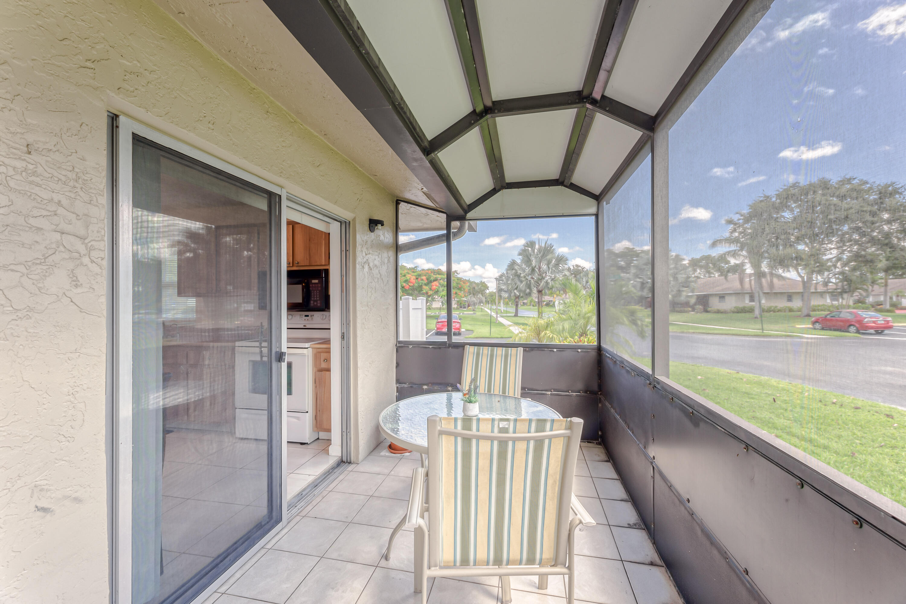 8916 Rheims Road Boca Raton, FL 33496 - Photo 14 of 31 SCREENED PORCH