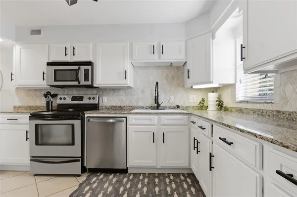 $447,000 | 2675 St Joseph Drive East, Unit D, Dunedin, FL 34698