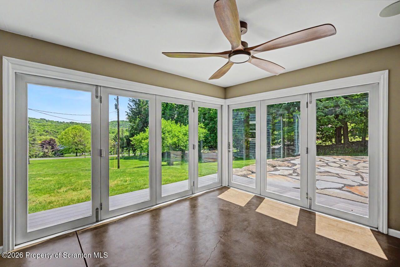 457 Craig Road Dalton, PA 18414 - Photo 50 of 114 a living room with hardwood floor and a large window