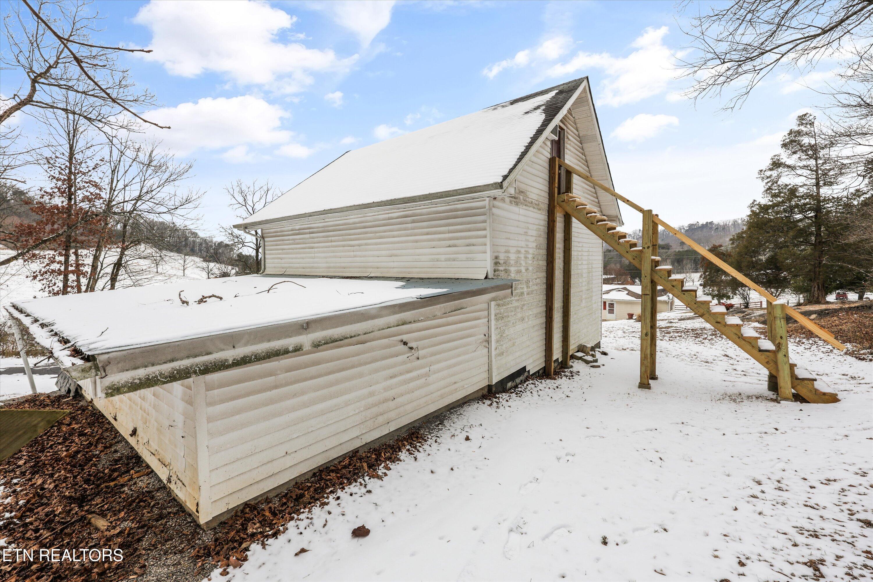 359 East Wolf Valley Road Heiskell, TN 37754 - Photo 26 of 40 359e-wolfvalley-rd-workshop-stairs