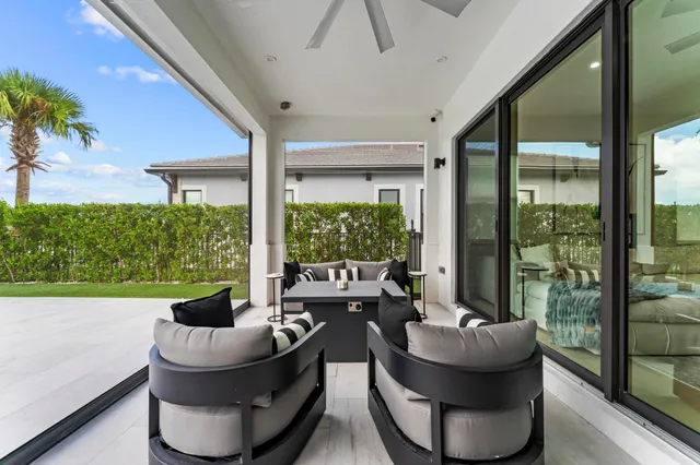 a bedroom with two beds and painting on the wall