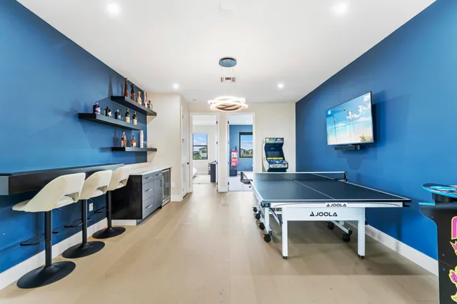 a view of yard with swimming pool and green space