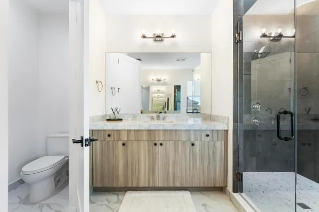 a view of a front of house with a street