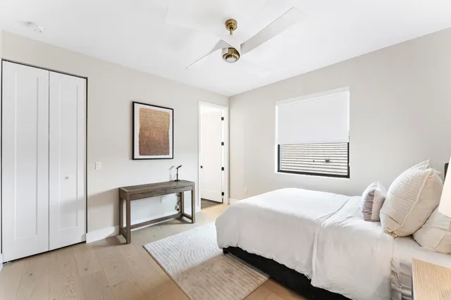 a swimming pool with outdoor seating yard and slide