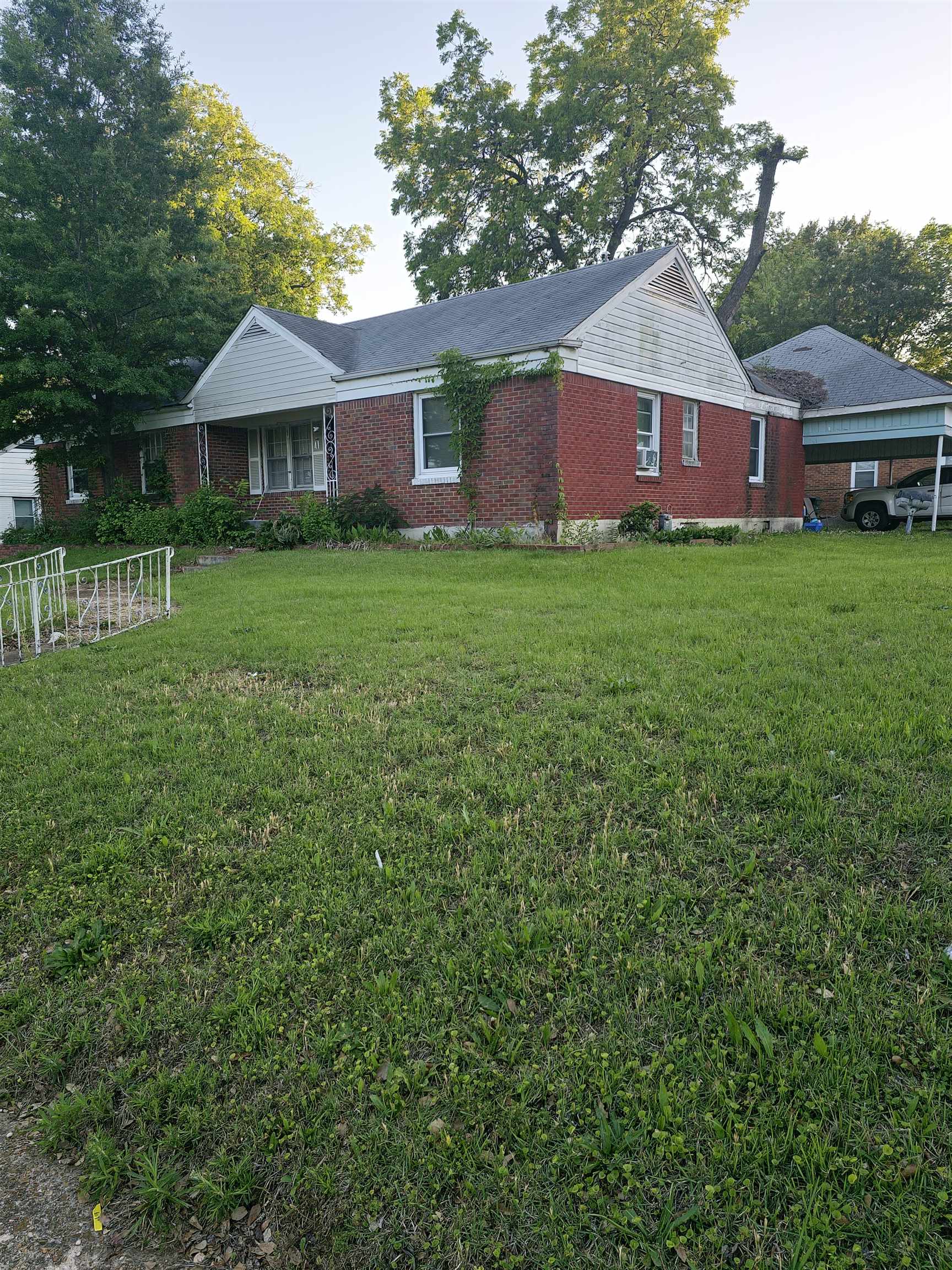 1515 Semmes Street Memphis, TN 38114 - Photo 2 of 9 Brick exterior with white siding accents and a covered front porch