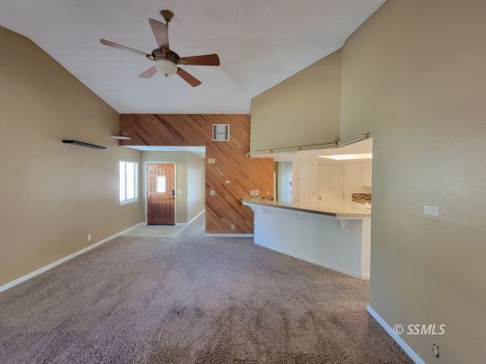 218 Kennedy Court Ridgecrest, CA 93555 - Photo 8 of 19 a view of a room with a ceiling fan