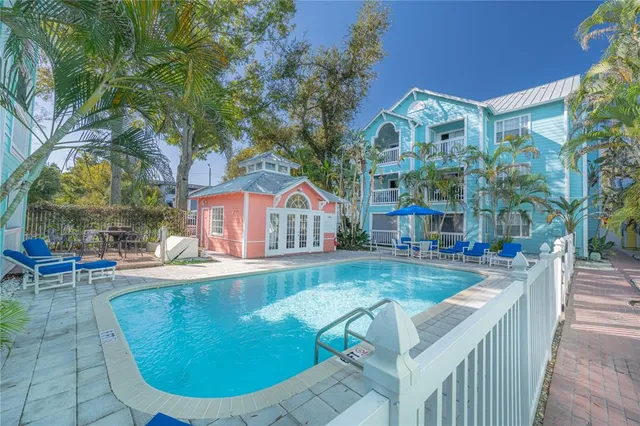 a view of a house with swimming pool