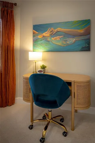 a bedroom with a bed and dresser