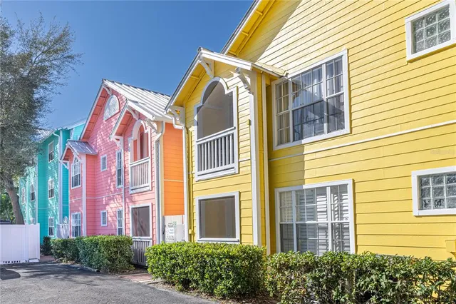 a view of a cars parked in front of a house