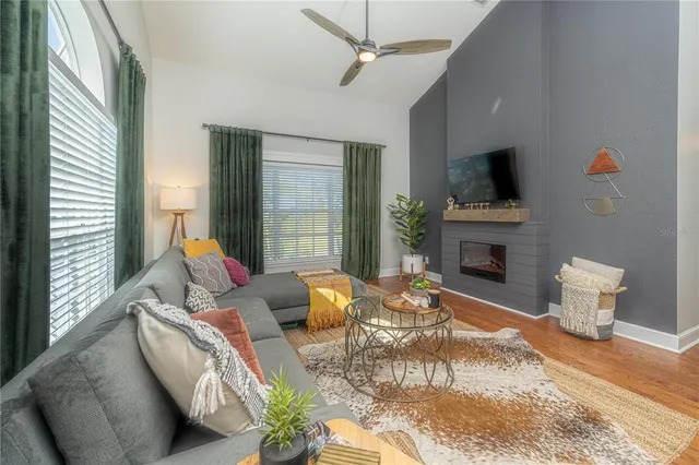 a living room with furniture and a window