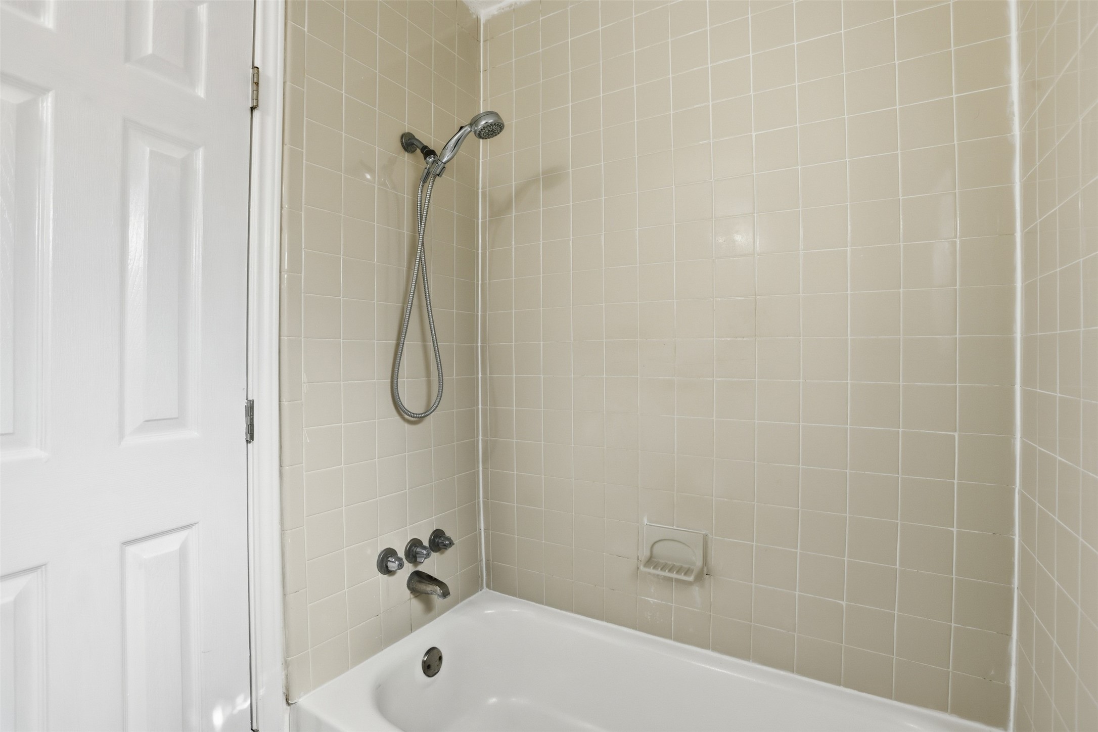 827 Parkhill Street Channelview, TX 77530 - Photo 16 of 26 a bathroom with a shower