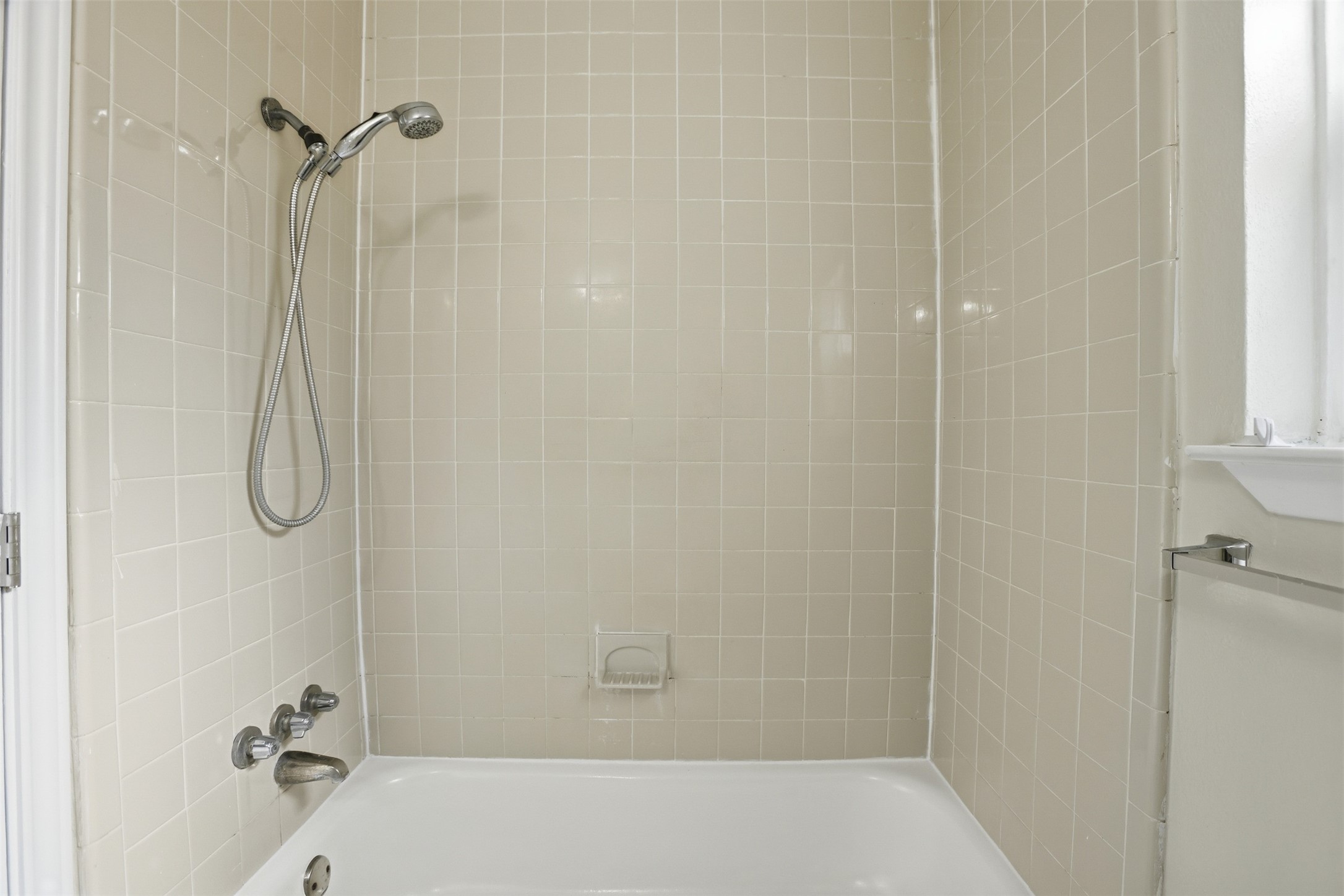 827 Parkhill Street Channelview, TX 77530 - Photo 17 of 26 a bathroom with a shower