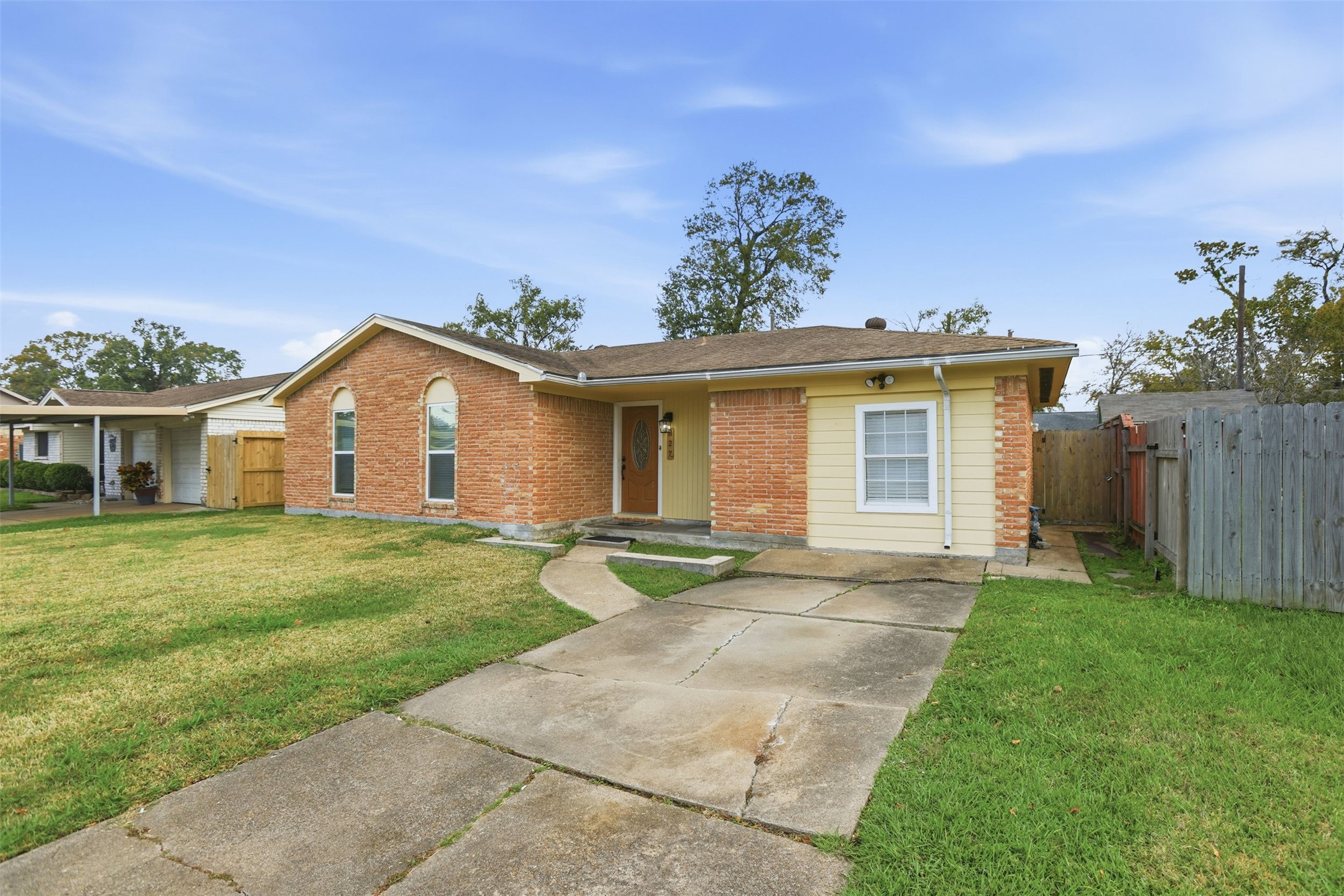 827 Parkhill Street Channelview, TX 77530 - Photo 2 of 26 front view of a house with a yard