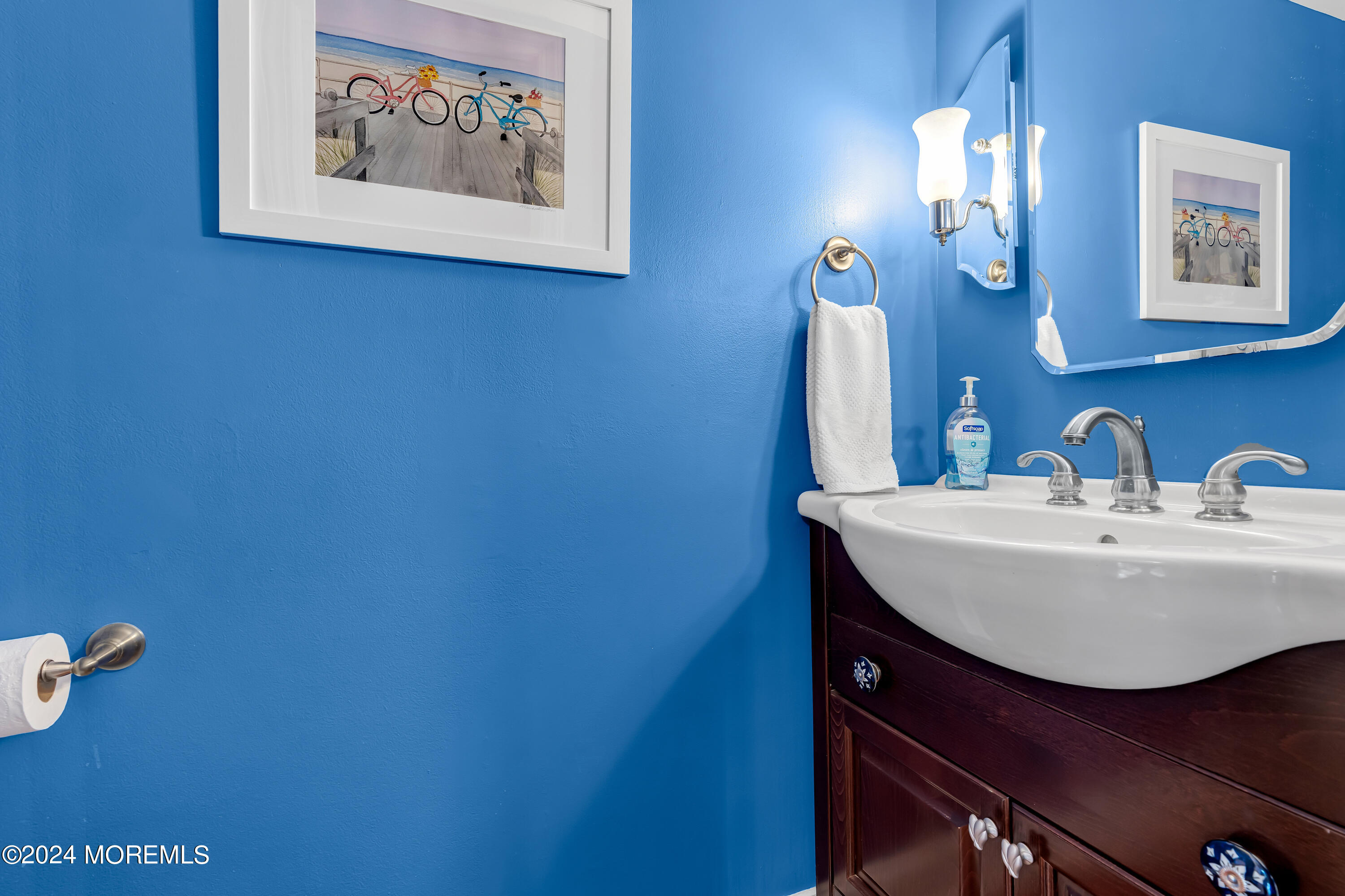 16 Spruce Lane Spring Lake Heights, NJ 07762 - Photo 15 of 31 a bathroom with a sink and a mirror