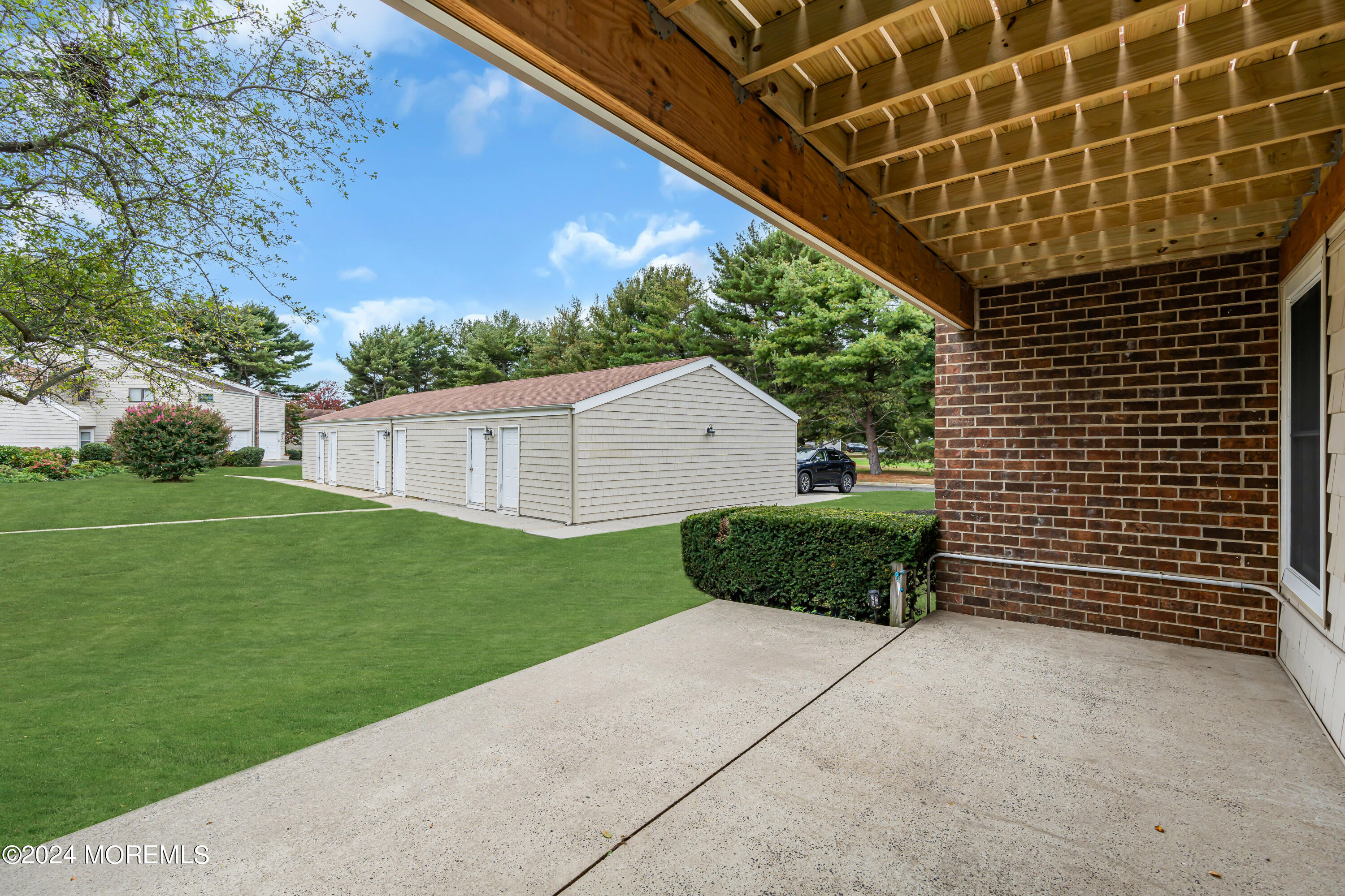 16 Spruce Lane Spring Lake Heights, NJ 07762 - Photo 29 of 31 a view of a backyard with a garden