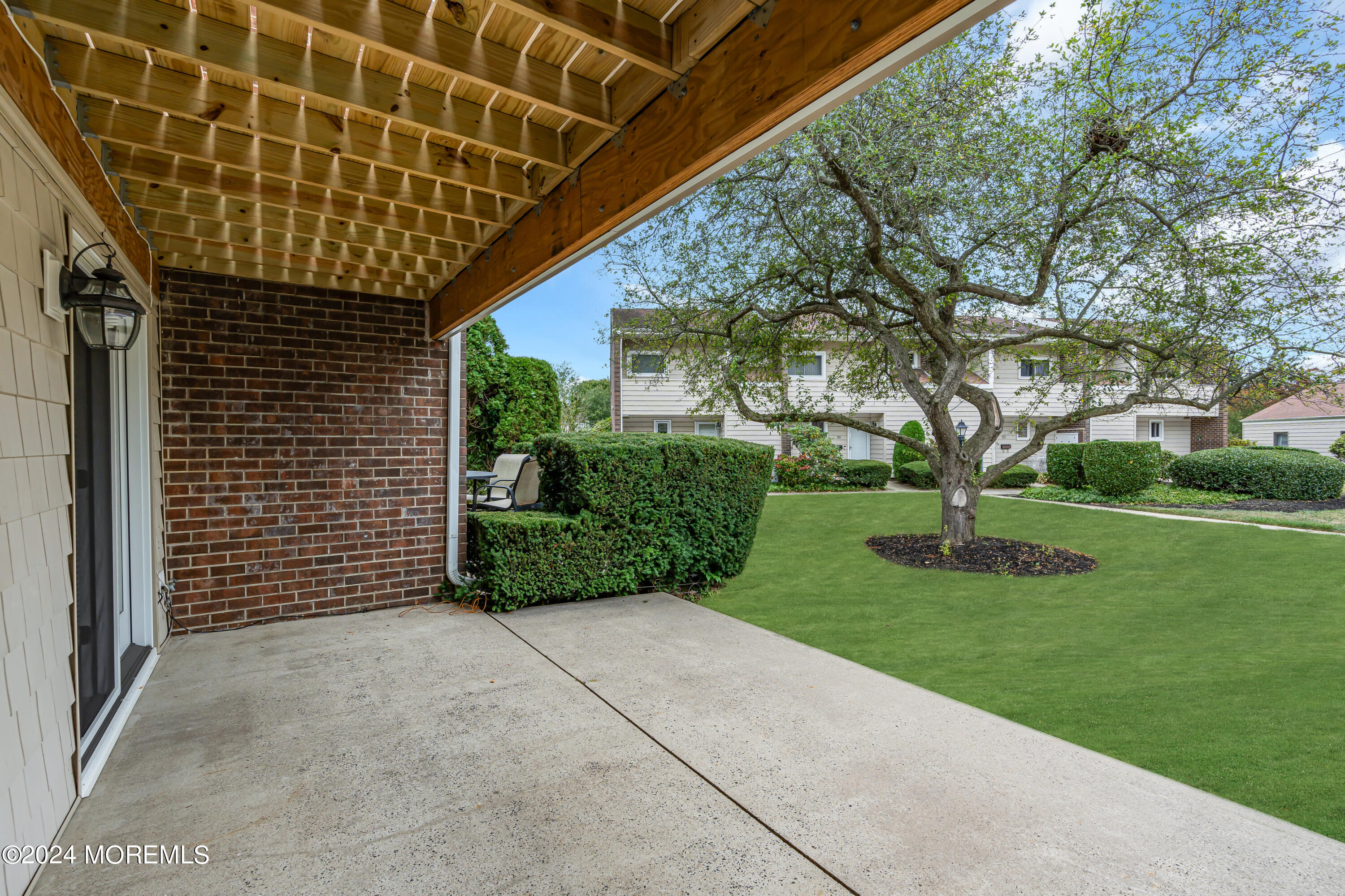 16 Spruce Lane Spring Lake Heights, NJ 07762 - Photo 30 of 31 a view of a porch with a backyard