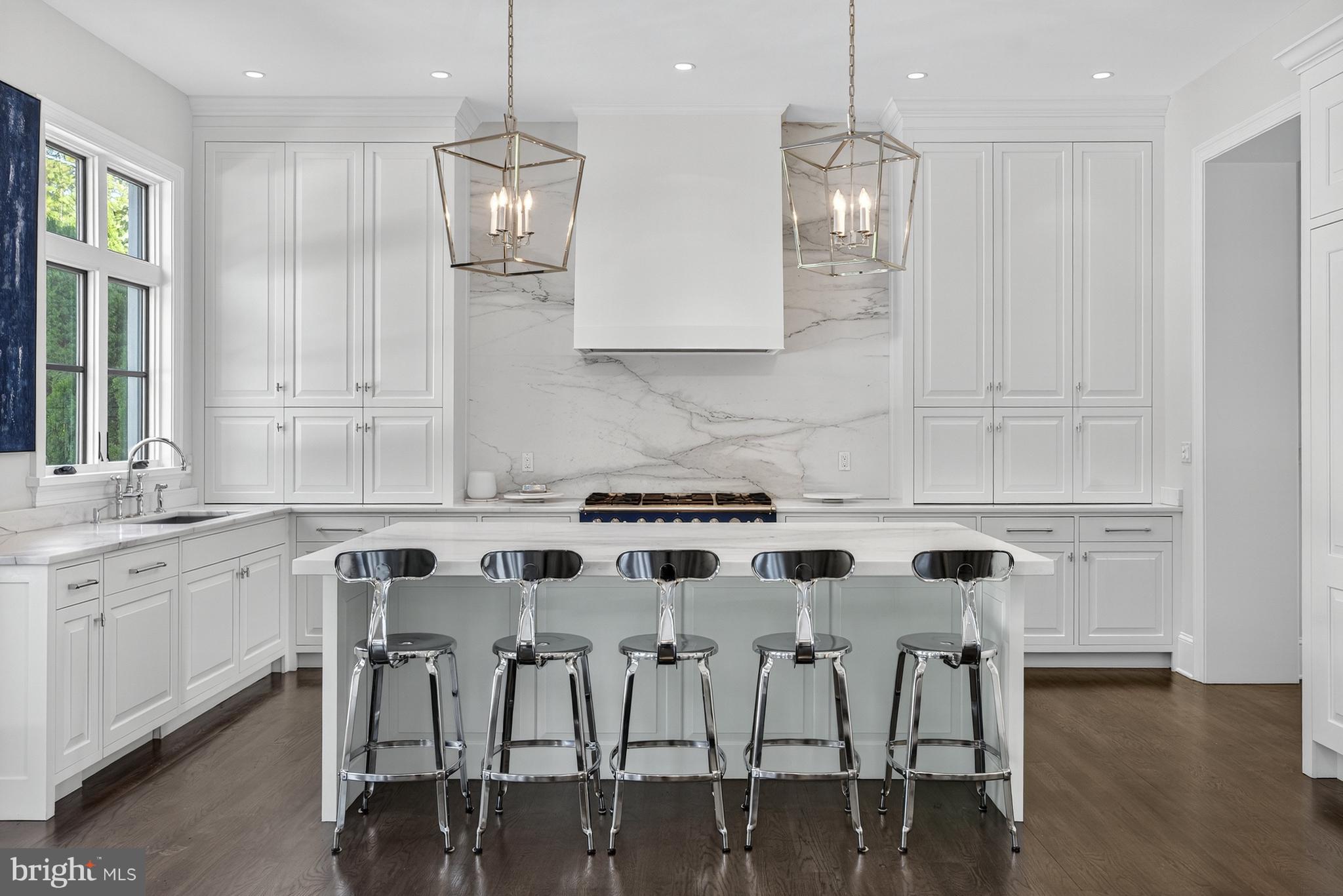 2107 Foxhall Road Northwest Washington, DC 20007 - Photo 33 of 64 Beautiful marble backsplash with custom range hood