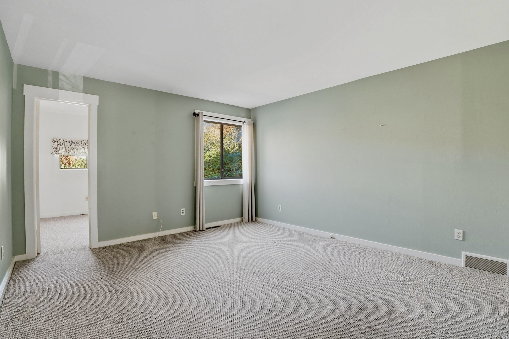 375 Piute Lane, Unit B Stratford, CT 06614 - Photo 23 of 39 a view of an empty room and window