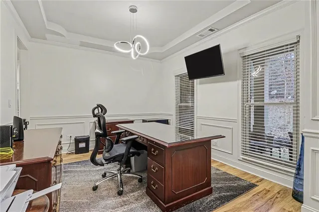 a view of a workspace with furniture