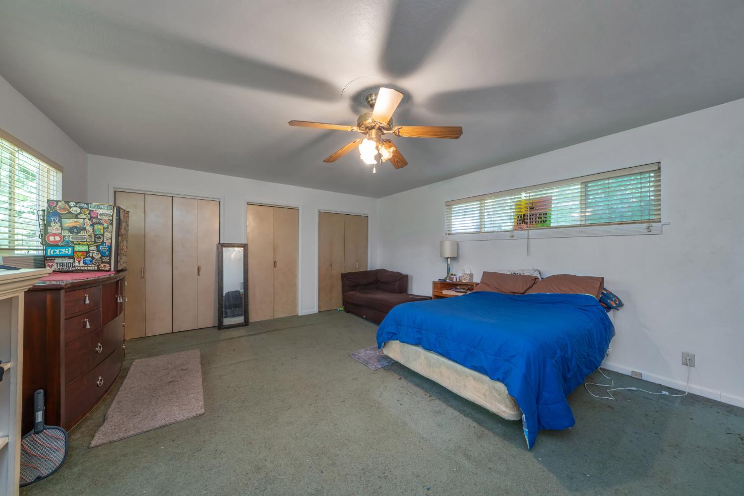 6929 Split Bend Road Pollock Pines, CA 95726 - Photo 28 of 38 a bedroom with a bed and a chandelier