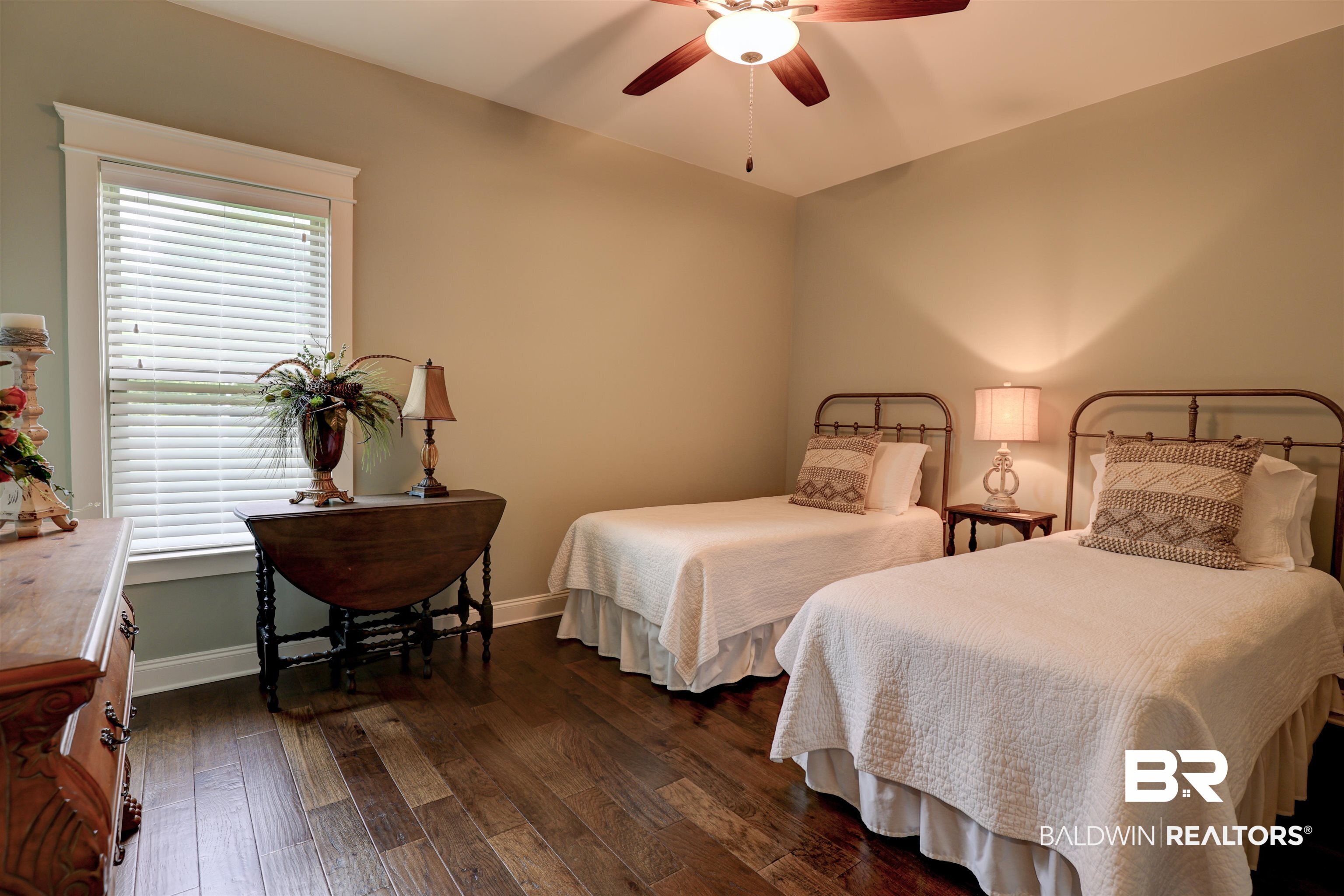 10588 Leesburg Pike Daphne, AL 36526 - Photo 22 of 29 Bedroom featuring dark hardwood / wood-style flooring and ceiling fan