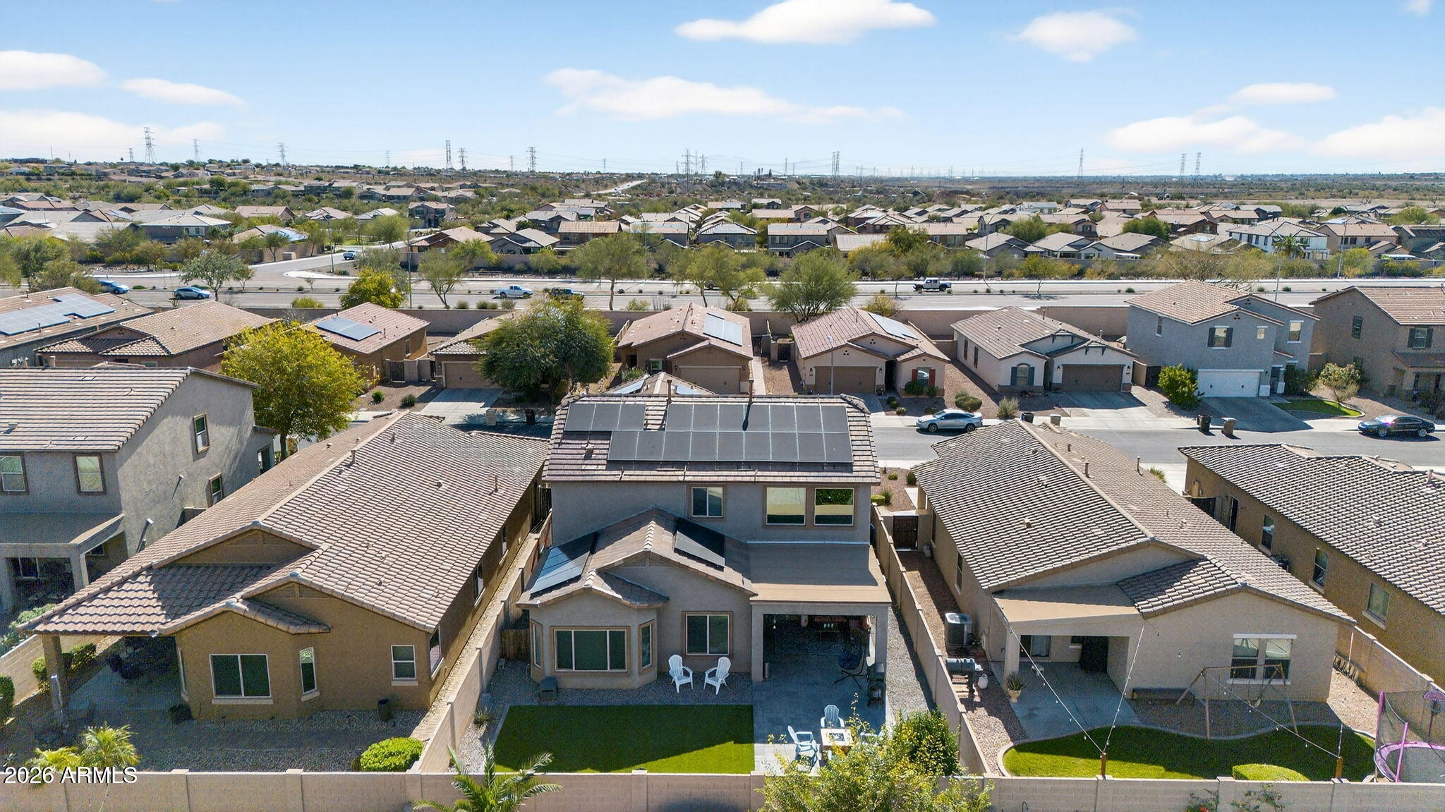 10840 West Saddlehorn Road Peoria, AZ 85383 - Photo 38 of 55 an aerial view of residential houses with city view