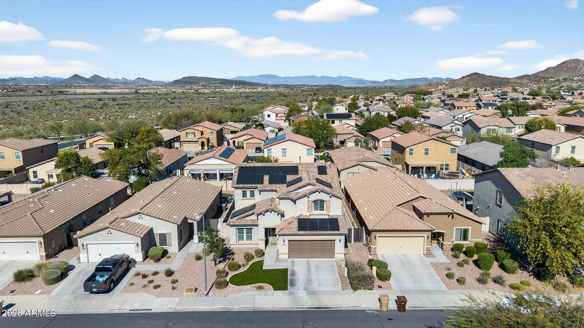 10840 West Saddlehorn Road Peoria, AZ 85383 - Photo 52 of 55 an aerial view of residential houses with outdoor space and ocean view