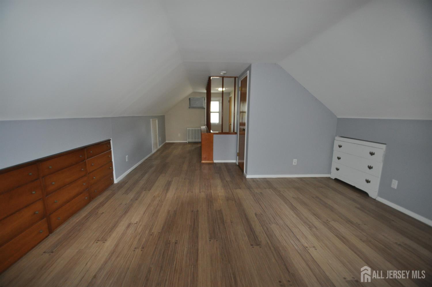 213 Old Post Road Edison, NJ 08817 - Photo 12 of 18 a view of empty room with wooden floor