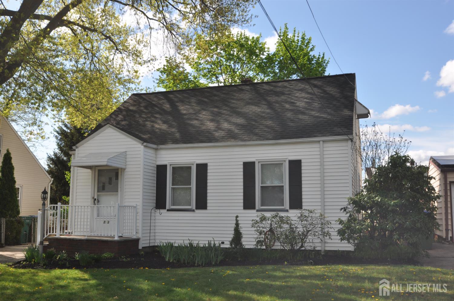 213 Old Post Road Edison, NJ 08817 - Photo 2 of 18 a front view of house with yard
