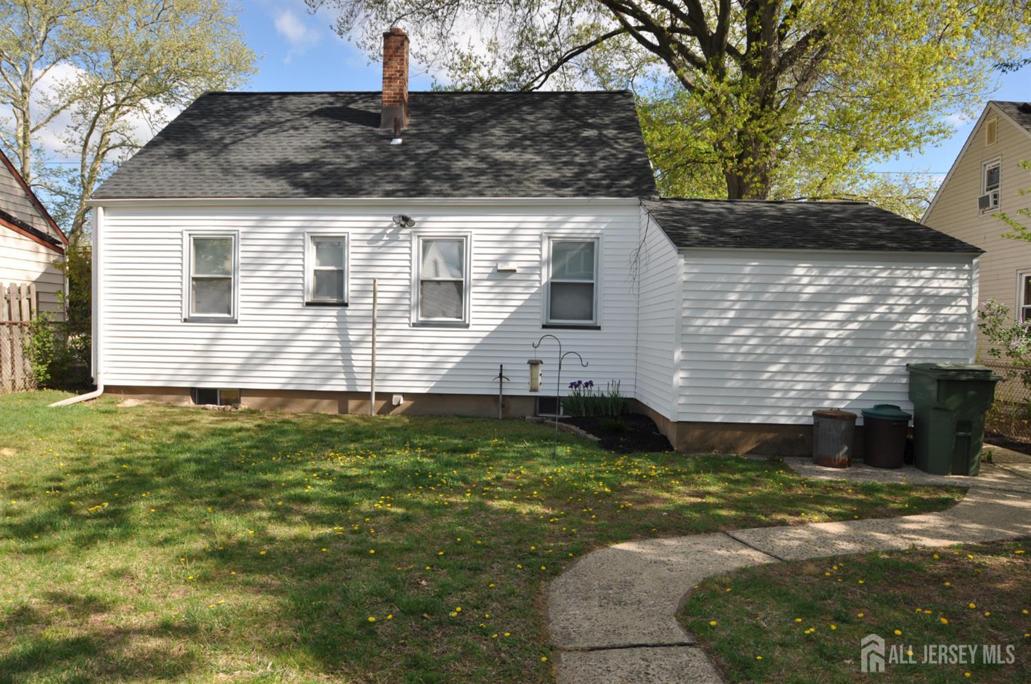 213 Old Post Road Edison, NJ 08817 - Photo 4 of 18 a view of a house with a yard