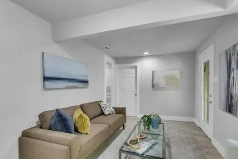 a living room with furniture and a couch