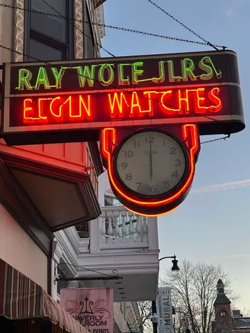 a view of a street with a building in the background