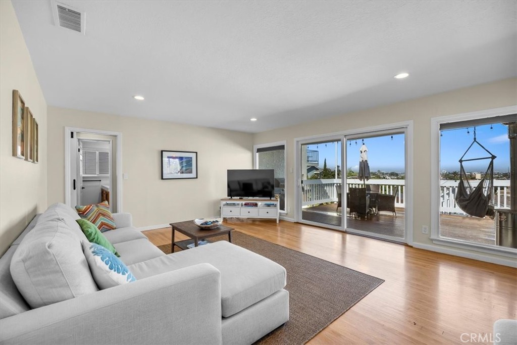 2407 Ripley Avenue Redondo Beach, CA 90278 - Photo 2 of 39 a living room with furniture and a flat screen tv