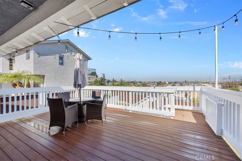 2407 Ripley Avenue Redondo Beach, CA 90278 - Photo 21 of 39 a view of a deck with wooden floor and furniture
