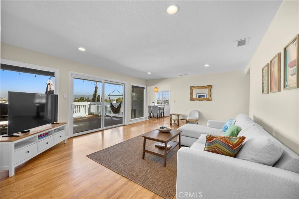 2407 Ripley Avenue Redondo Beach, CA 90278 - Photo 4 of 39 a living room with furniture and a flat screen tv
