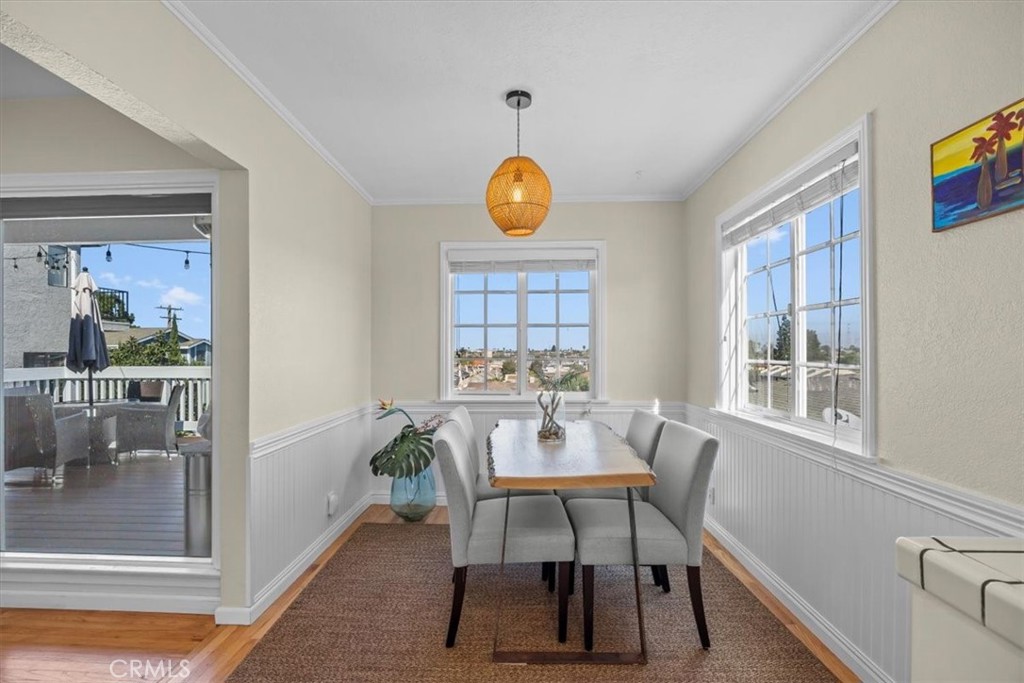2407 Ripley Avenue Redondo Beach, CA 90278 - Photo 5 of 39 a view of a dining room with furniture window and wooden floor