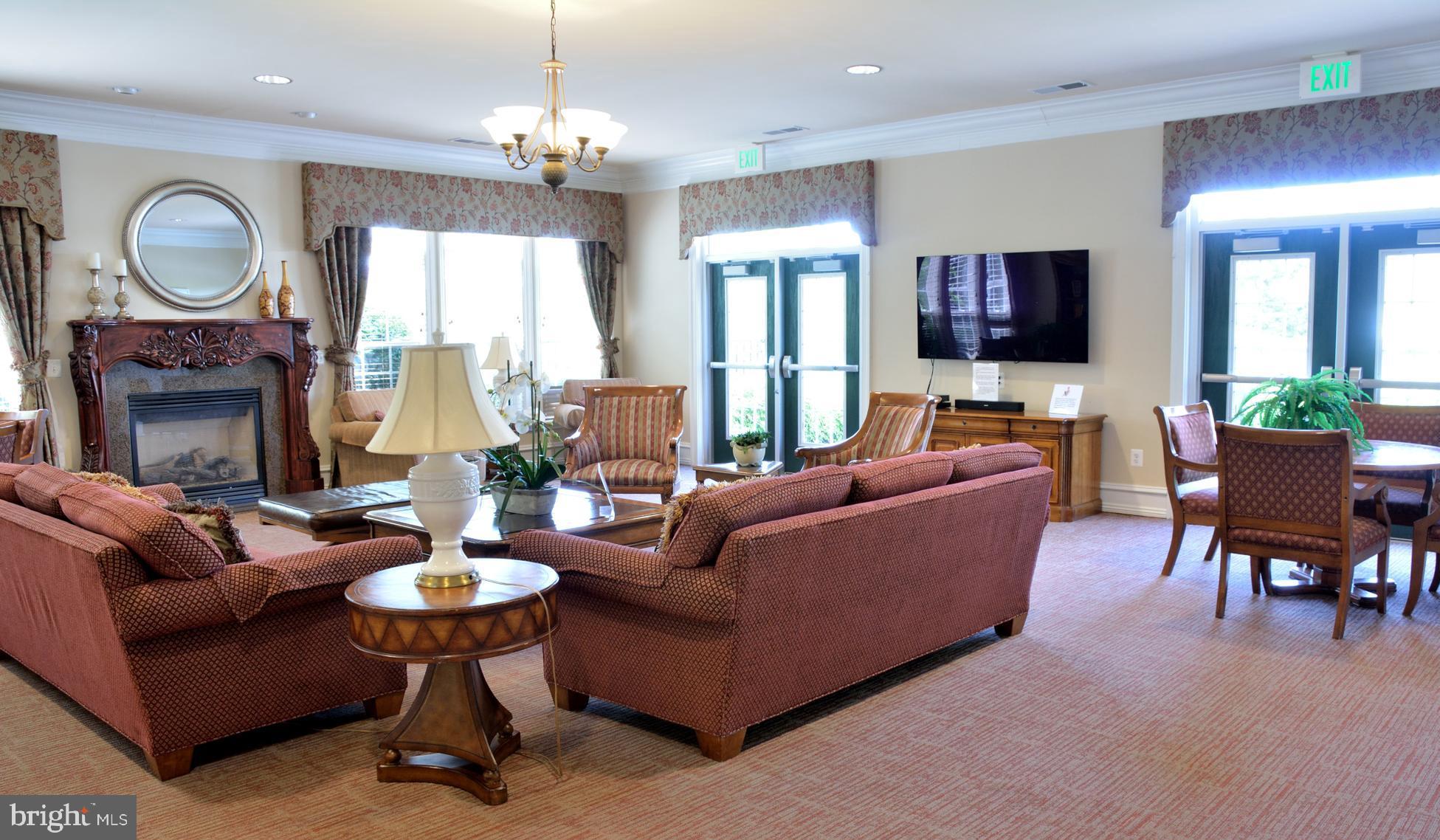 7305 Maplecrest Road, Unit 406 Elkridge, MD 21075 - Photo 20 of 26 Interior Party Room with Fireplace