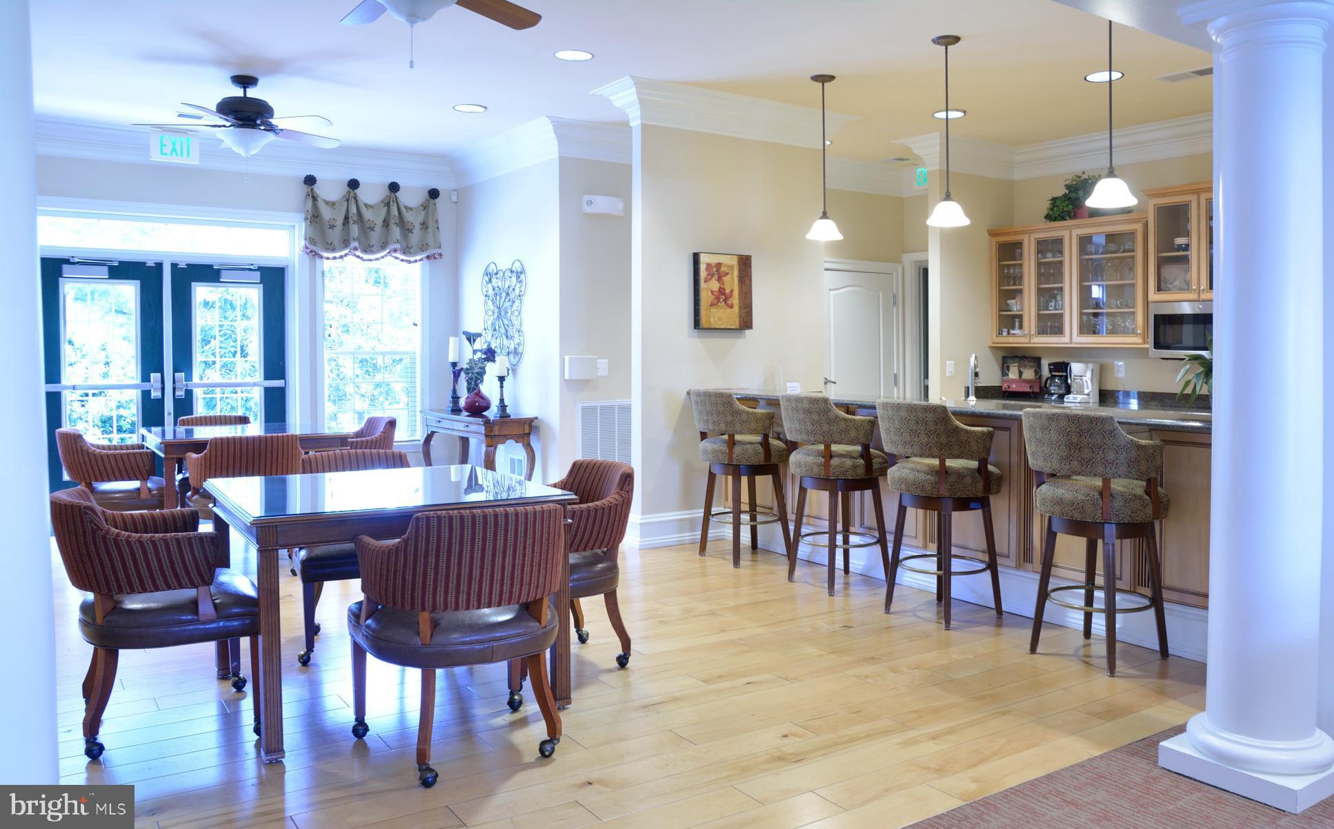 7305 Maplecrest Road, Unit 406 Elkridge, MD 21075 - Photo 22 of 26 Eating Area With Bar