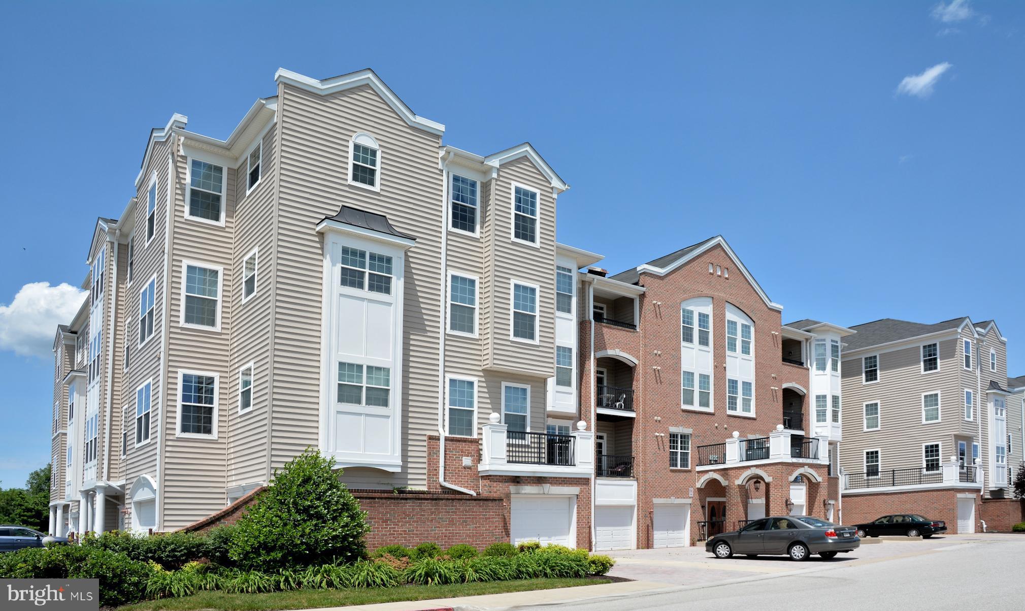 7305 Maplecrest Road, Unit 406 Elkridge, MD 21075 - Photo 3 of 26 Manicured grounds with Tennis Courts and Swimming