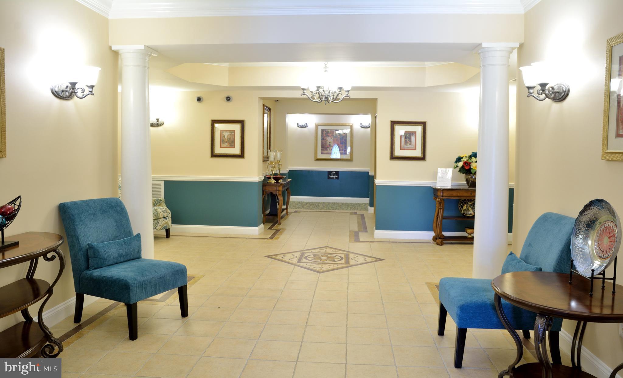 7305 Maplecrest Road, Unit 406 Elkridge, MD 21075 - Photo 4 of 26 Lovely Lobby Decor