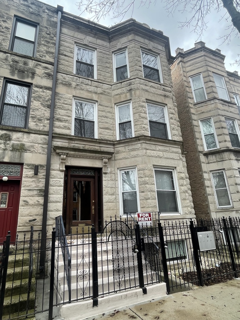 a front view of a multi story residential apartment building