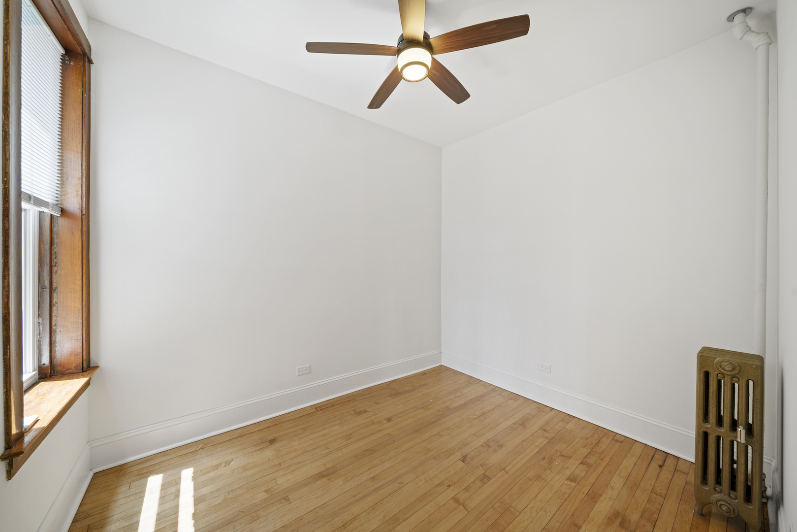 2545 West Walton Street, Unit 2 Chicago, IL 60622 - Photo 12 of 20 a view of empty room with wooden floor